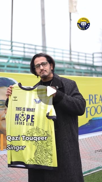 Reel thumbnail showing Qazi Touqeer holding the Real Kashmir SonyLIV campaign jersey